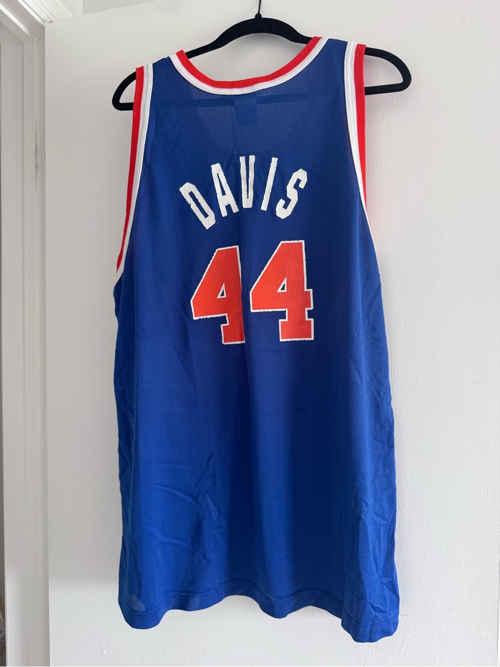 Champion Blue Basketball Jersey with Red Logo Accent - Picture 4 of 4